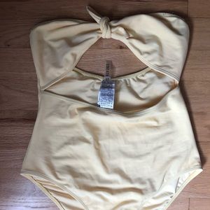 Super cute pastel yellow tube swim!